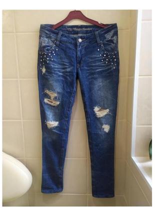 Стильные, модные рваные джинсы