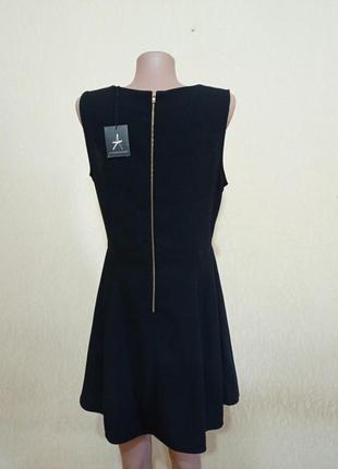 Черное новое платье 46-48 размера расклешонное к низу с молнией8 фото