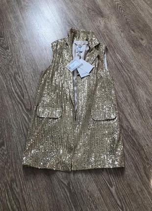 Жилетка стильна