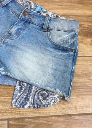 Короткі джинсові шорти з кишенями виступаючими8 фото