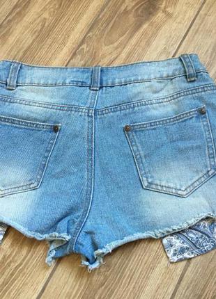 Короткі джинсові шорти з кишенями виступаючими3 фото
