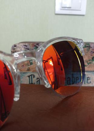 Солнцезащитные очки с цветным стеклом в прозрачной оправе2 фото