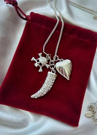 Нарядная цепочка с подвесками: череп сердце и кинжал,бренд river island