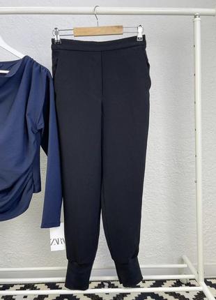 Черные брюки