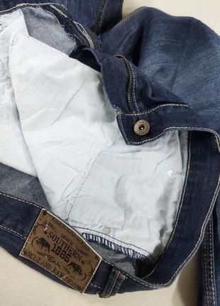 Фірмові джинси темно-синього кольору.5 фото