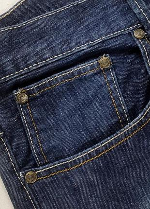 Фірмові джинси темно-синього кольору.3 фото