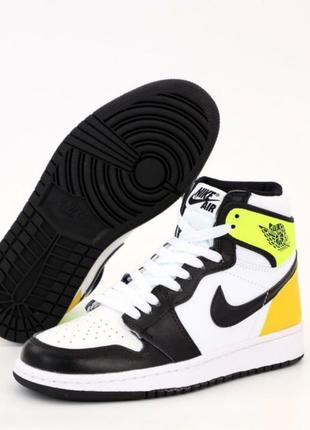 Кроссовки женские желтые высокие nike air jordan 1 mid2 фото