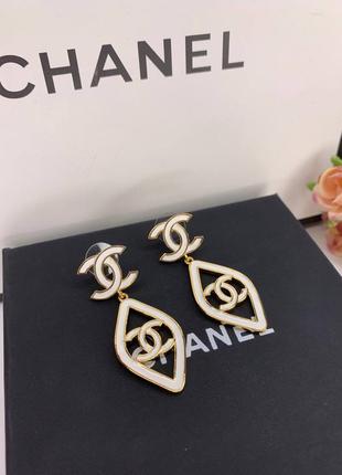 Брендові довгі сережки