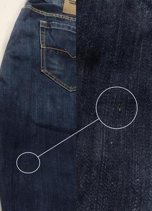 Класичні темні джинси10 фото