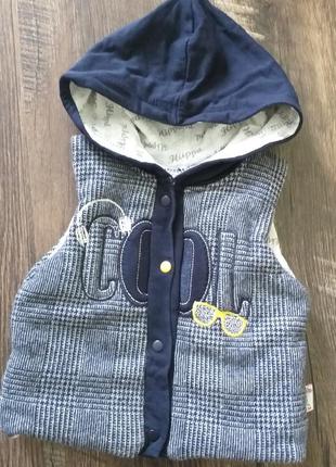 Тепла безрукавка желетка