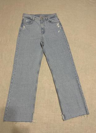 Актуальные джинсы с широкими штанинами4 фото