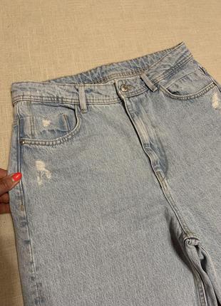 Актуальные джинсы с широкими штанинами6 фото