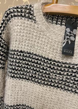 Очень красивый и стильный брендовый вязаный свитер-оверсайз в полоску.4 фото