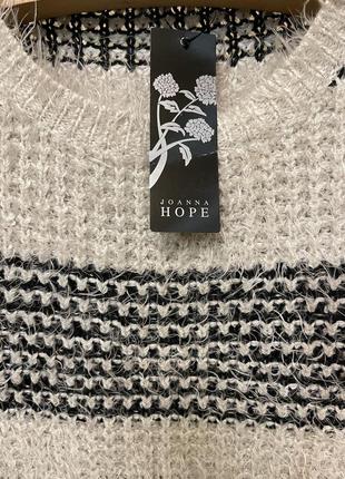 Очень красивый и стильный брендовый вязаный свитер-оверсайз в полоску.3 фото
