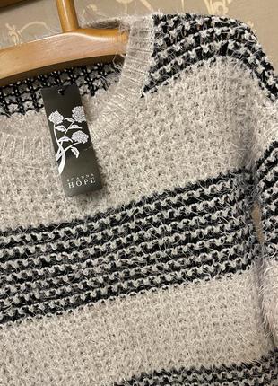 Очень красивый и стильный брендовый вязаный свитер-оверсайз в полоску.8 фото