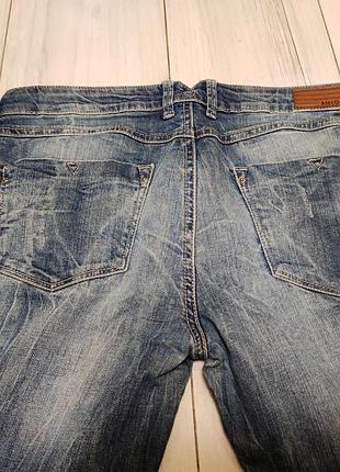 Джинсы 8