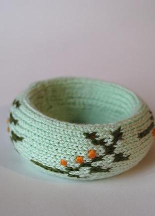 Плетений браслет м'ятного кольору