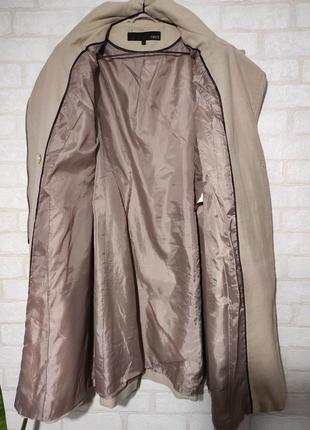 Демисезонное, стильное, брендовое пальто с косой молнией9 фото