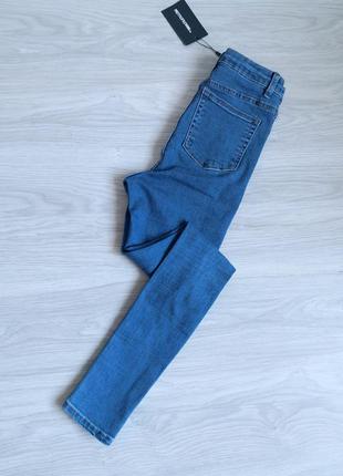 Синие джинсы скинни с равными коленями на высокой посадке7 фото