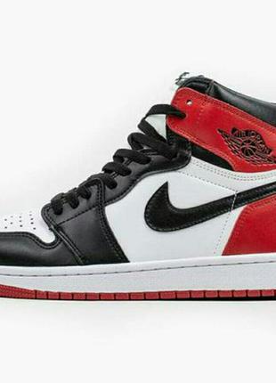 Nike jordan retro 1 кросівки чоловічі біло чорні з червоними вставками шкіра8 фото