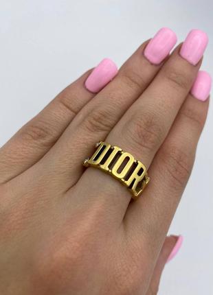 Кольцо женское брендовое золотистое плетение буквы