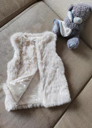 Хутряна жилетка