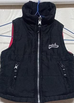 Жилетка, безрукавка