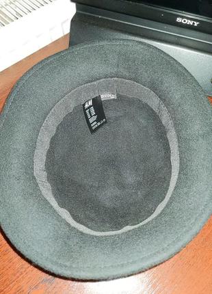 Стильная шерстяная шляпа от именитого бренда.5 фото