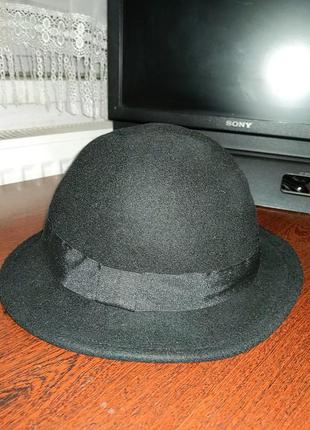 Стильная шерстяная шляпа от именитого бренда.6 фото
