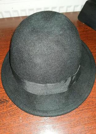 Стильная шерстяная шляпа от именитого бренда.7 фото