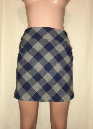 Оригинал.юбка полушерстяная в клеточку  серого - темного цвета.шесть- 50%, вискоза- 50%
