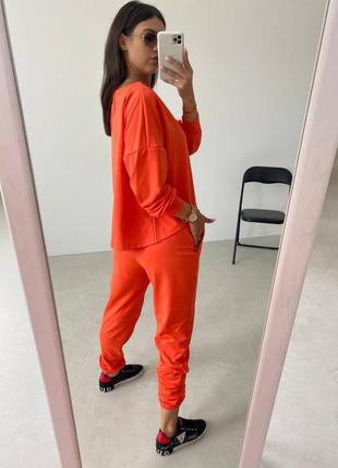 Костюмчик спортивный, прогулочный (кофта и брюки) оранжевый2 фото