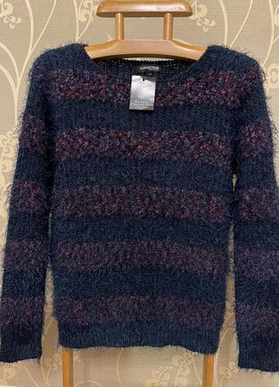 Очень красивый и стильный брендовый вязаный свитер в полоску.1 фото