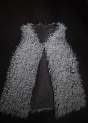 Меховая жилетка