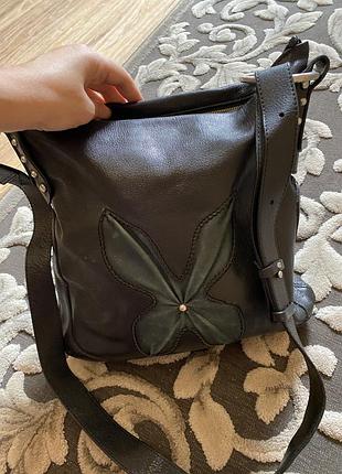 Кожаная сумочка,з длиной ручкой