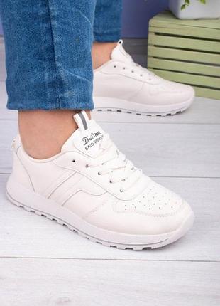 Жіночі світло-бежеві кросівки на шнурівці