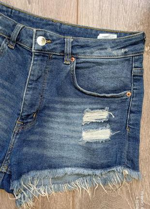 Сині, блакитні стрейч короткі джинсові шорти з тотертостями і бахромою від h&m2 фото