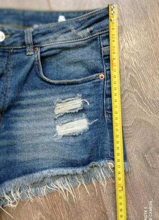 Сині, блакитні стрейч короткі джинсові шорти з тотертостями і бахромою від h&m6 фото