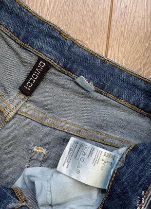 Сині, блакитні стрейч короткі джинсові шорти з тотертостями і бахромою від h&m5 фото