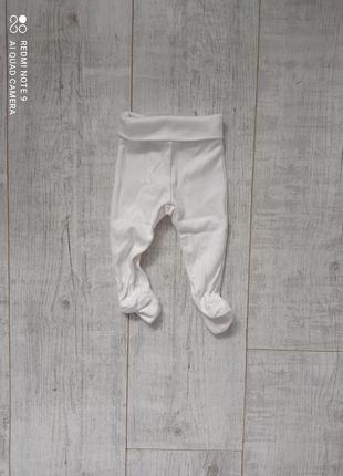 Білі повзунки2 фото