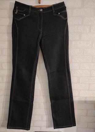 Качественные, плотные джинсы черного цвета1 фото