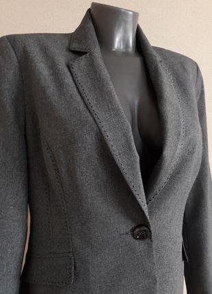 Красивый,деловой,стильный,полуприталенный пиджак,в мелкий принт1 фото