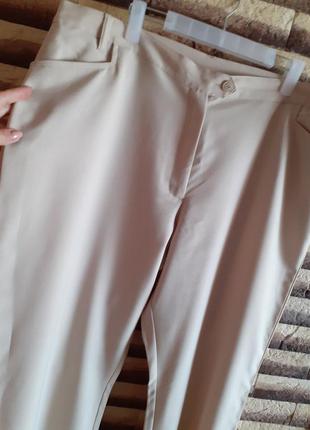 Білі класичні брюки на великий розмір.2 фото