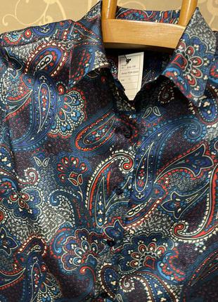 Очень красивая и стильная брендовая блузка в узорах.8 фото