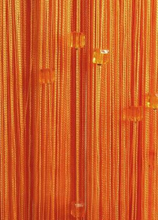 Оранжевые шторы-нити со стеклярусом1 фото
