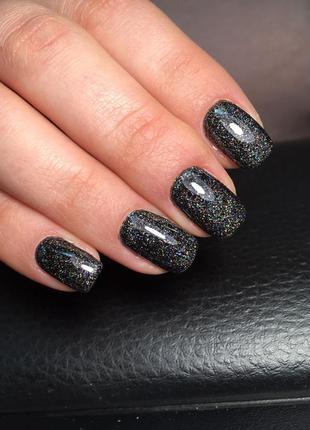 Чорний, космічний гель-лак з блискітками.