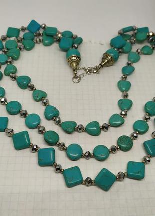 Бусы бирюзового цвета в три ряда