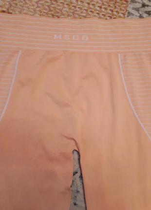 Безшовні легінси лосини missguided з високою талією, вставками в смужку і логотипом msgd на поясі10 фото