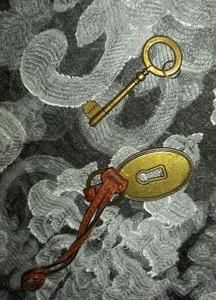 Підвіска для сумок fossil