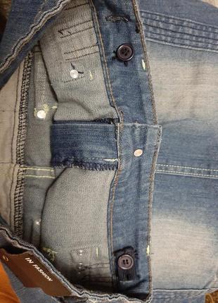 Стильная юбка джинсовая синяя мини с разноцветной строчкой греция7 фото